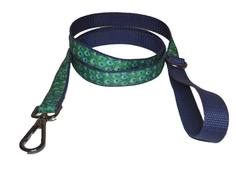 Pávatoll mintás póráz kék hevederrel Pávatoll mintás póráz kék hevederrel